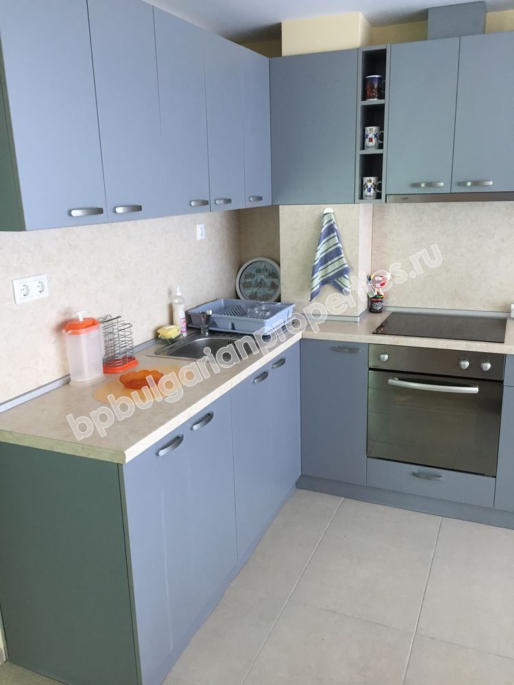 Furnished two-bedroom apartment with a car place for sale in the resort Ravda