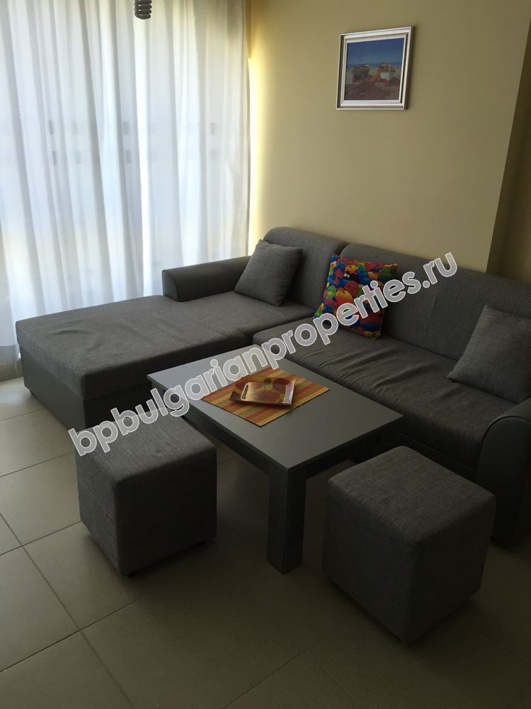 Furnished two-bedroom apartment with a car place for sale in the resort Ravda