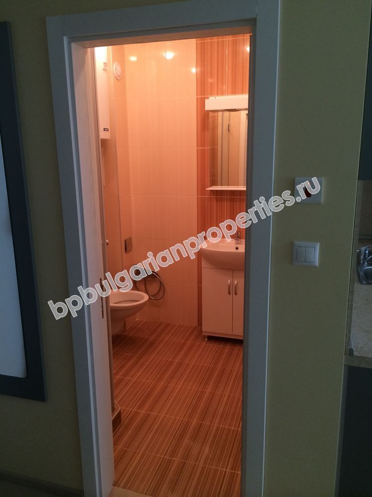 Furnished two-bedroom apartment with a car place for sale in the resort Ravda