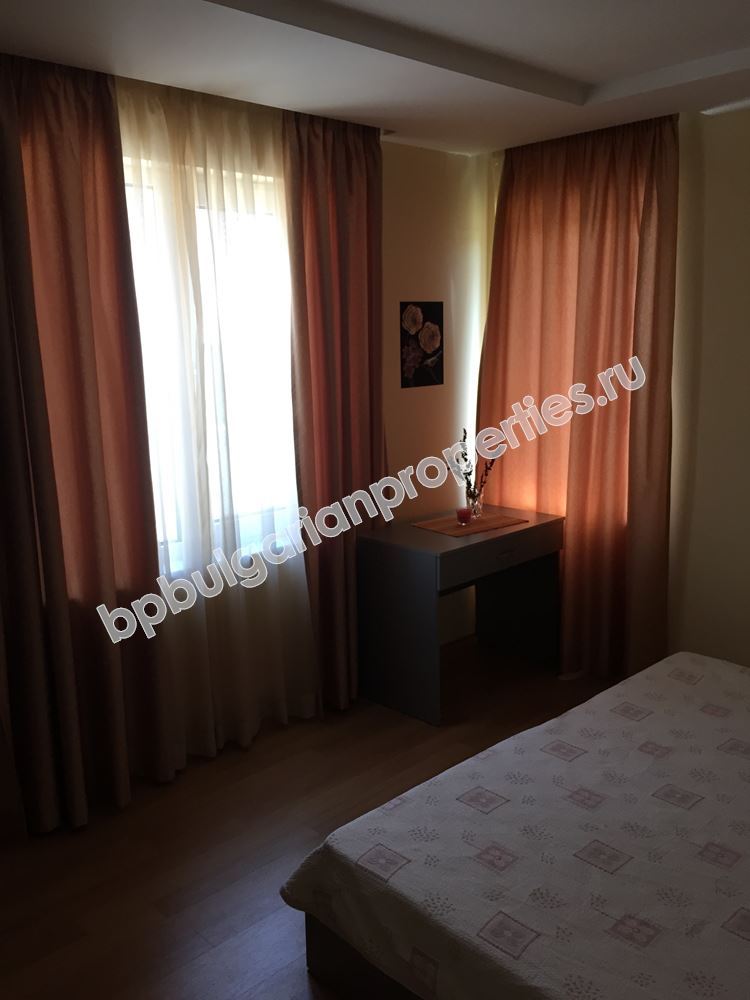 Furnished two-bedroom apartment with a car place for sale in the resort Ravda